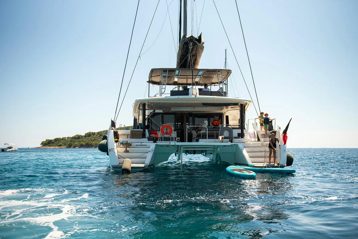Exterior view of Serenity, a Lagoon 52 catamaran at Grad Kaštela, Croatia