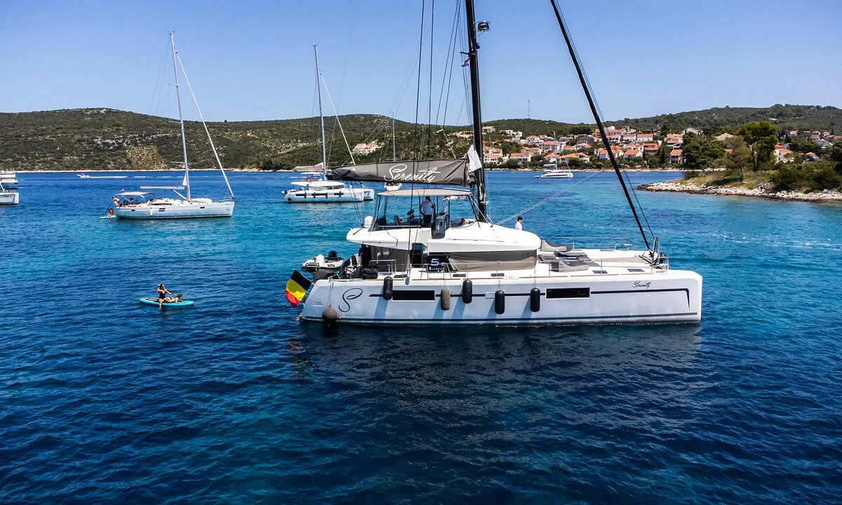 Exterior view of Serenity, a Lagoon 52 catamaran at Grad Kaštela, Croatia