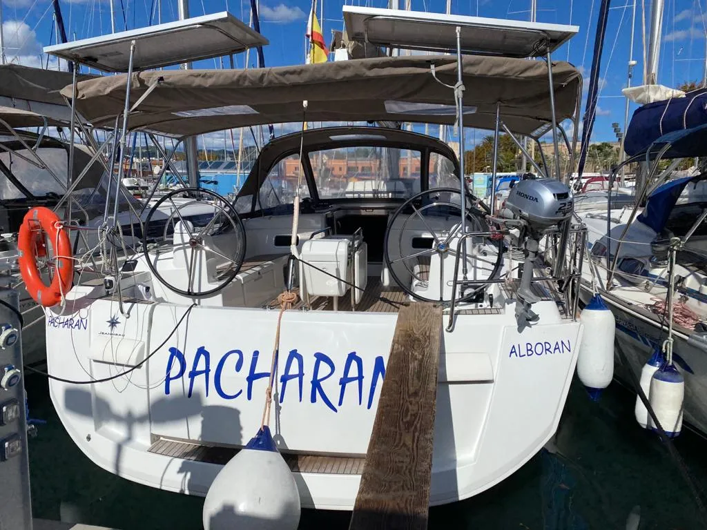 Exterior view of Alboran Pacharan (Majorca), a Jeanneau Sun Odyssey 519 sailboat at es Jonquet, Spain