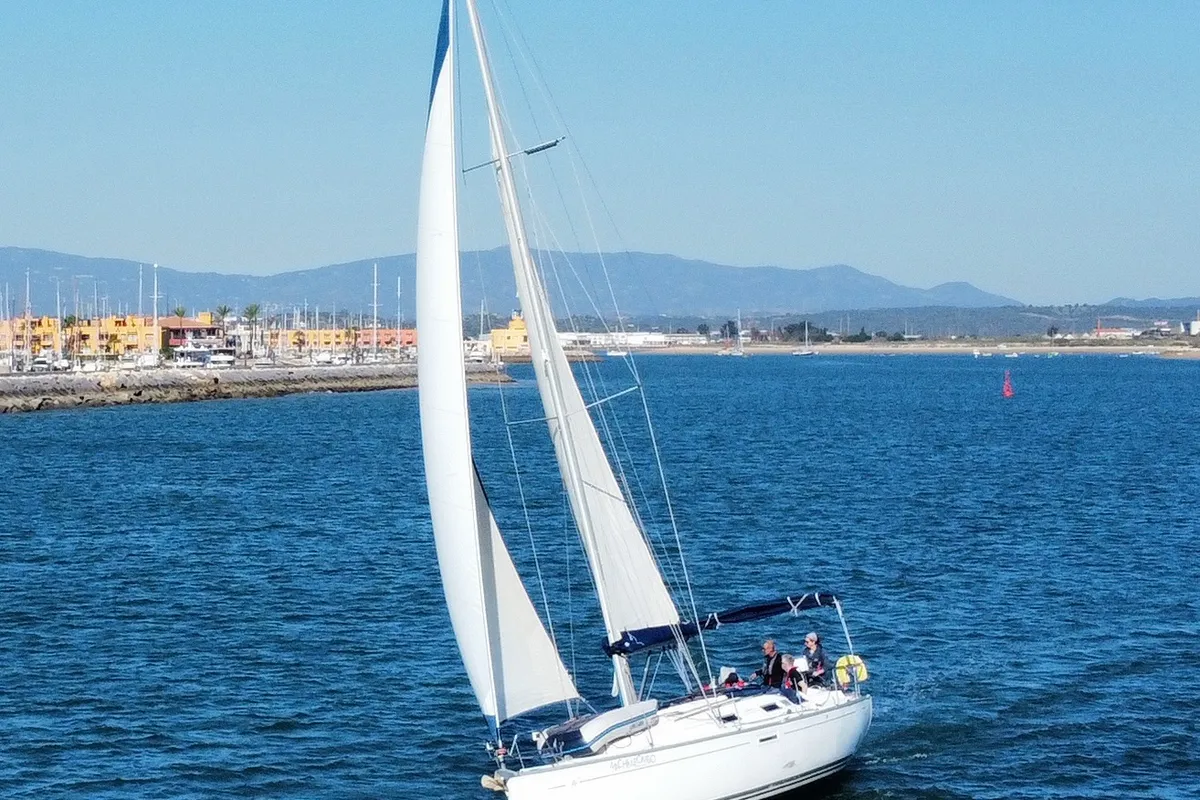 Exterior view of Machimbombo, a Dufour 385 Grand Large sailboat at Portimão, Portugal