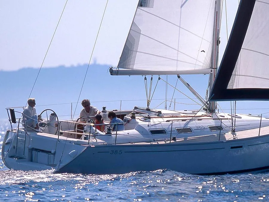 Exterior view of Machimbombo, a Dufour 385 Grand Large sailboat at Portimão, Portugal