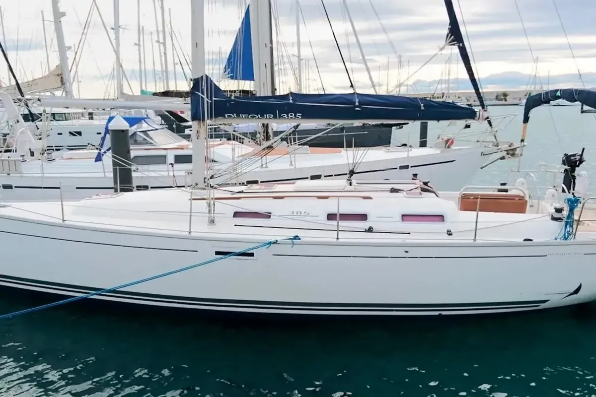 Exterior view of Machimbombo, a Dufour 385 Grand Large sailboat at Portimão, Portugal