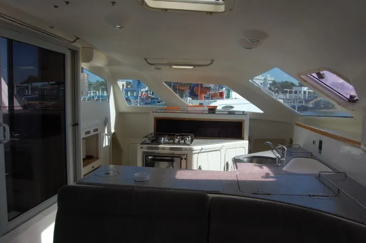 Galley of Alboran Mahanga (Majorca), a Voyage 440 catamaran at es Jonquet, Spain