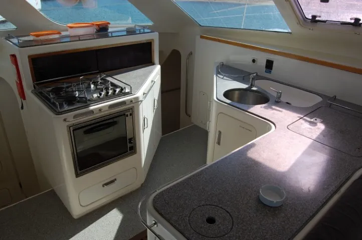 Galley of Alboran Mahanga (Majorca), a Voyage 440 catamaran at es Jonquet, Spain