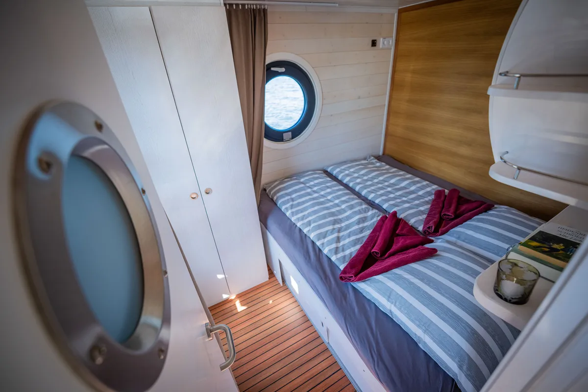 Cabin on Ariella, a Woma D13 motorboat at Fürstenberg/Havel, Germany