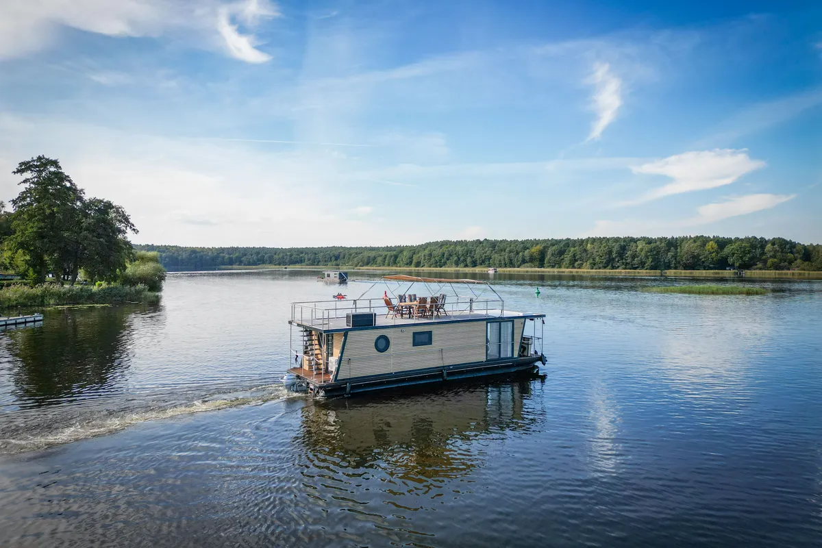 Exterior view of Ariella, a Woma D13 motorboat at Fürstenberg/Havel, Germany