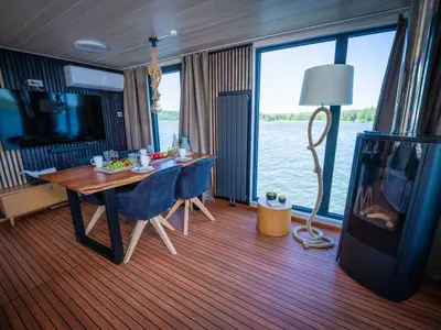 Salon of Ariella, a Woma D13 motorboat at Fürstenberg/Havel, Germany