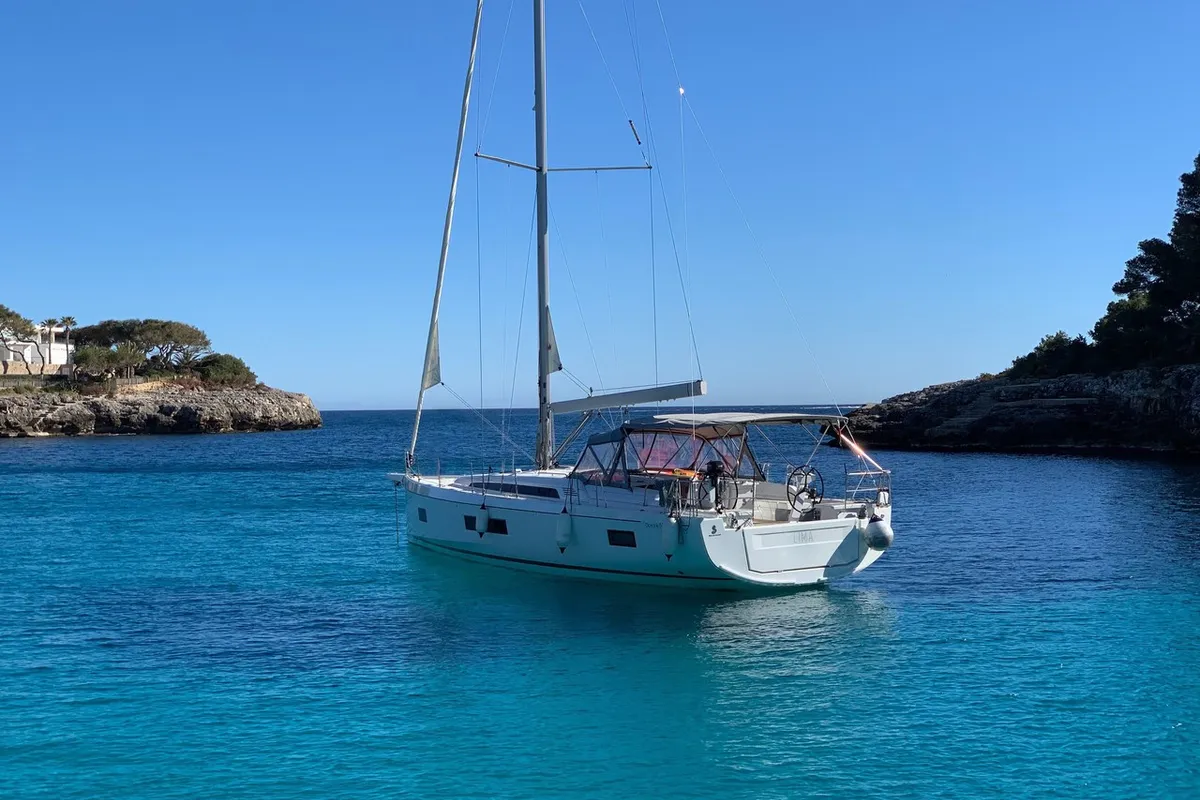 Exterior view of Lima, a Beneteau Oceanis 51.1 sailboat at Cala Egos, Spain