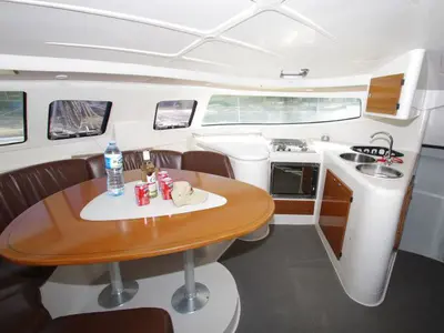 Salon of LaPerla, a Fountaine Pajot Athena 38 catamaran at Cienfuegos, Cuba