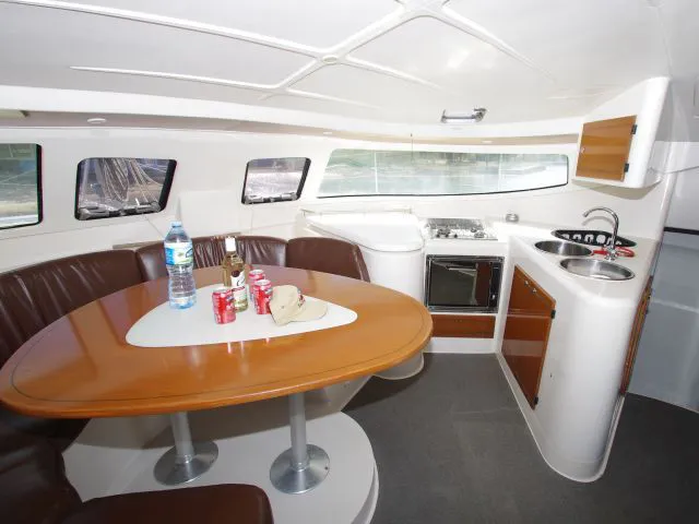 Salon of LaPerla, a Fountaine Pajot Athena 38 catamaran at Cienfuegos, Cuba