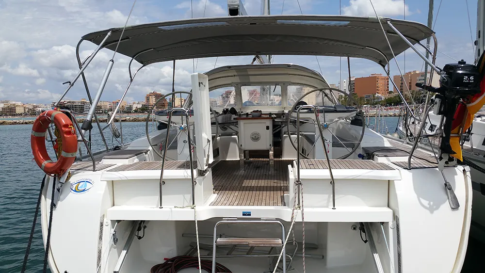 Exterior view of Maximum, a Bavaria Cruiser 56 sailboat at Llucmajor, Spain