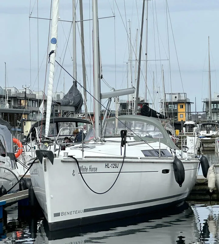 Exterior view of White Horse, a Beneteau Oceanis 37 sailboat at Flensburg, Germany