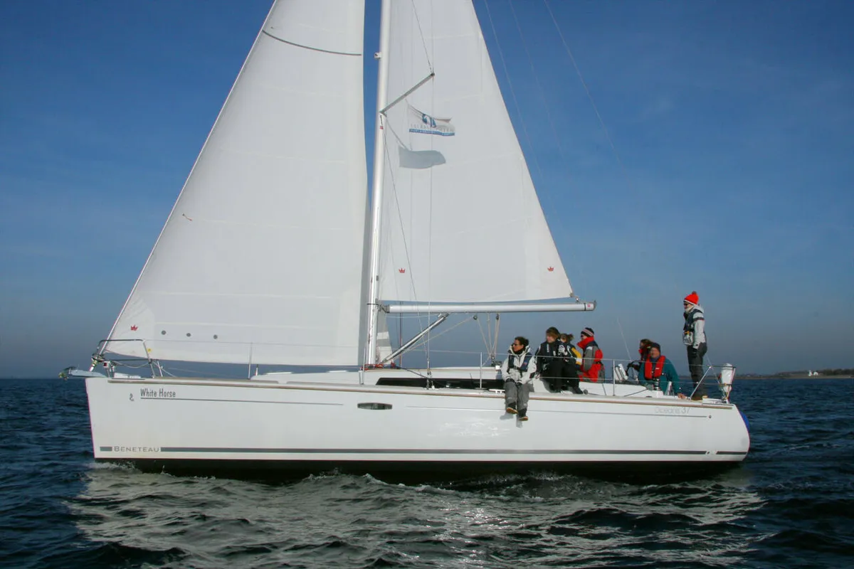 Exterior view of White Horse, a Beneteau Oceanis 37 sailboat at Flensburg, Germany