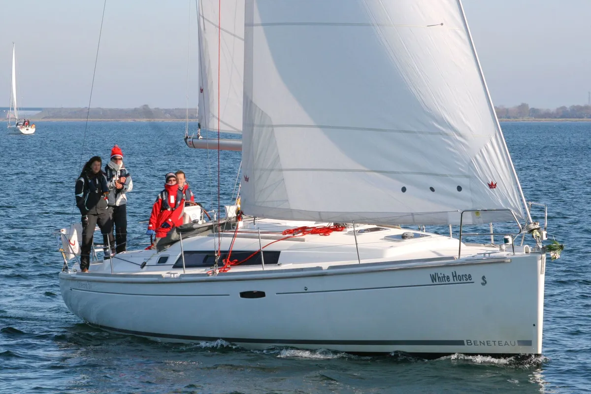 Exterior view of White Horse, a Beneteau Oceanis 37 sailboat at Flensburg, Germany