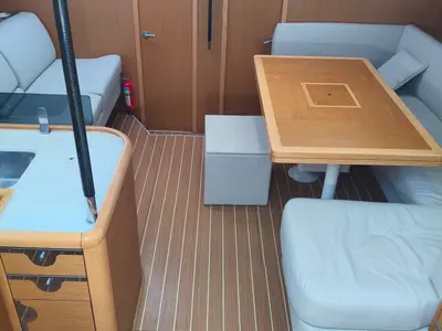 Salon of Keep Calm, a Jeanneau 53 sailboat at Olbia, Italy