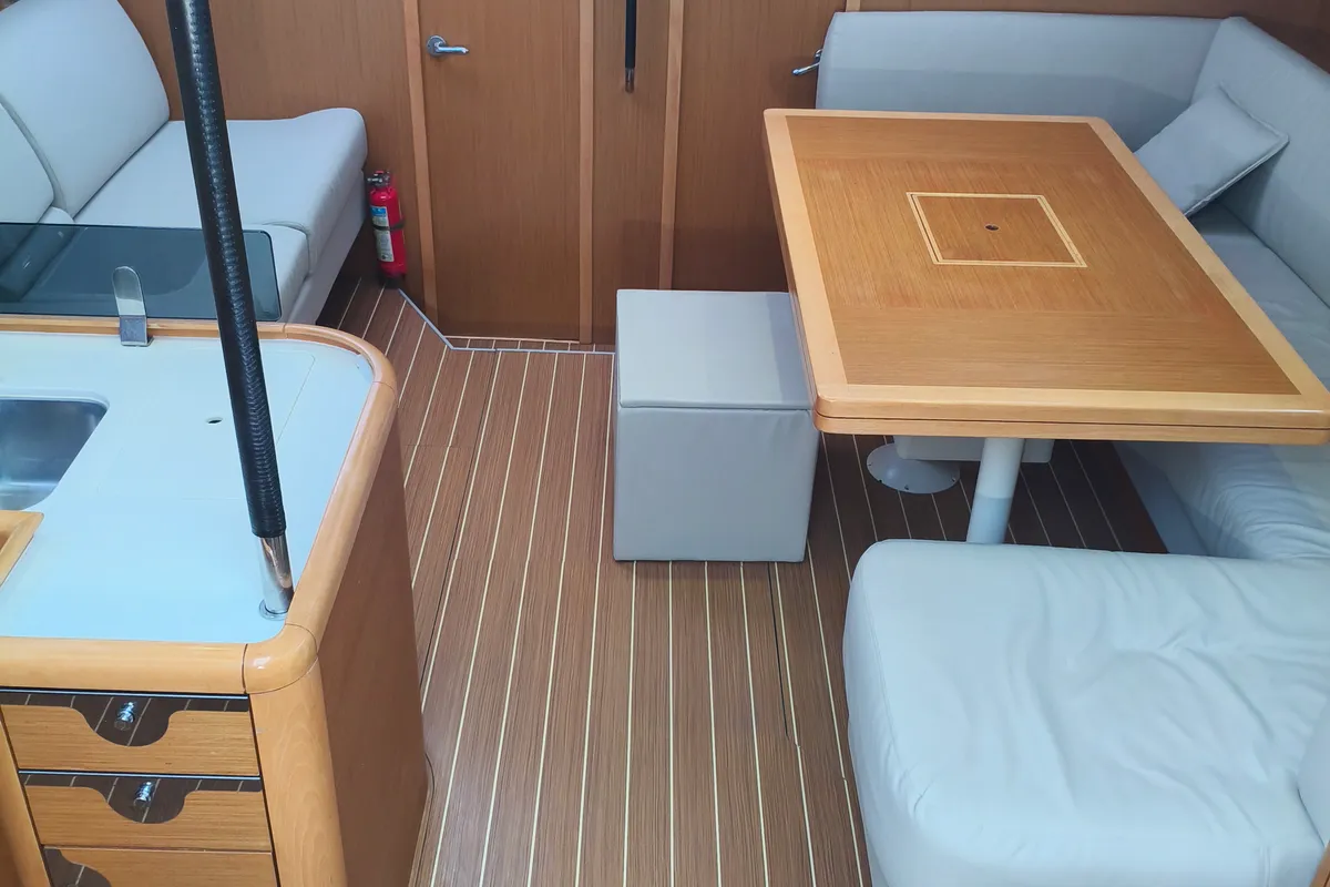 Salon of Keep Calm, a Jeanneau 53 sailboat at Olbia, Italy