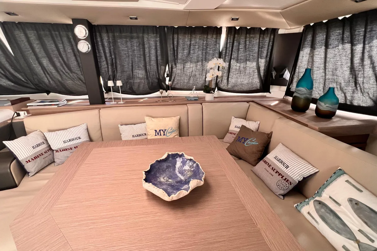 Salon of Sonrisa, a Fountaine Pajot Tanna 47 catamaran at Olbia, Italy