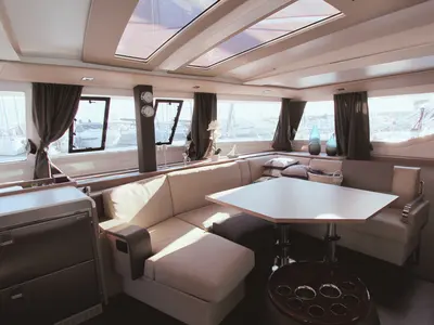 Salon of Sonrisa, a Fountaine Pajot Tanna 47 catamaran at Olbia, Italy
