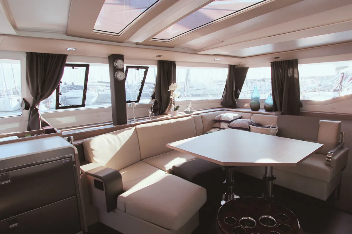 Salon of Sonrisa, a Fountaine Pajot Tanna 47 catamaran at Olbia, Italy
