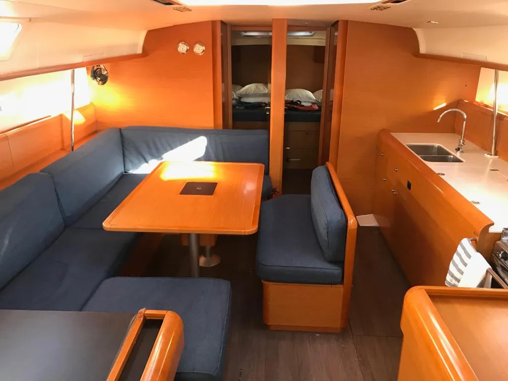 Salon of Alboran Bourbon, a Jeanneau Sun Odyssey 519 sailboat at es Jonquet, Spain