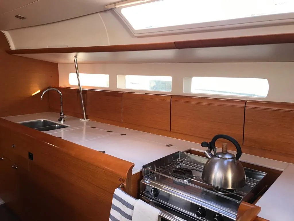 Galley of Alboran Bourbon, a Jeanneau Sun Odyssey 519 sailboat at es Jonquet, Spain