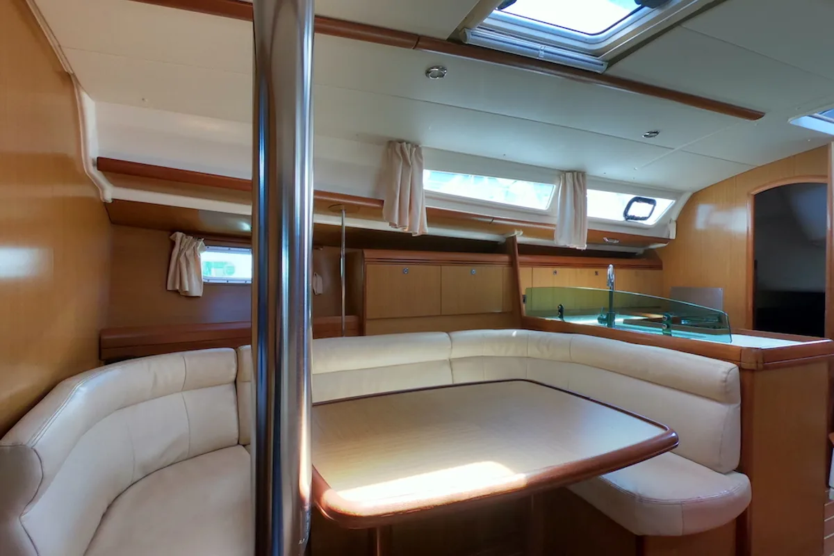 Salon of Cabiria, a Jeanneau Sun Odyssey 39i sailboat at Olbia, Italy