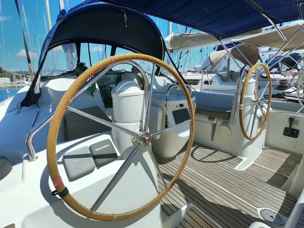 Cockpit of Cabiria, a Jeanneau Sun Odyssey 39i sailboat at Olbia, Italy