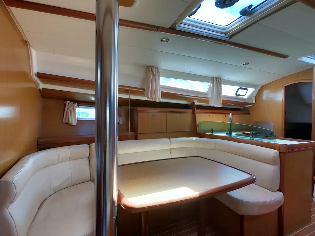 Salon of Cabiria, a Jeanneau Sun Odyssey 39i sailboat at Olbia, Italy