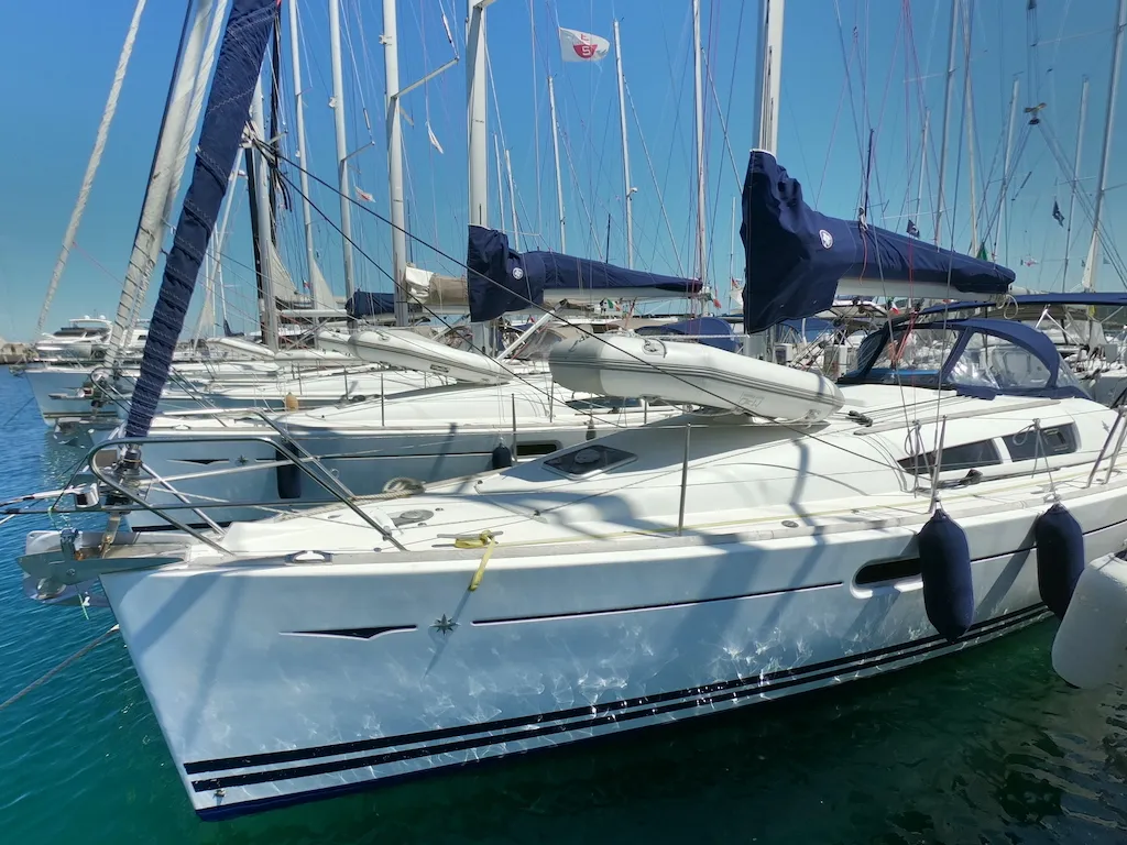 Exterior view of Cabiria, a Jeanneau Sun Odyssey 39i sailboat at Olbia, Italy
