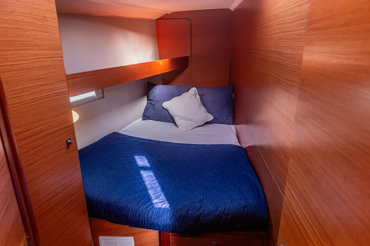 Cabin on Mania Planet, a Dufour 460 Grand Large sailboat at Tonnarella, Italy