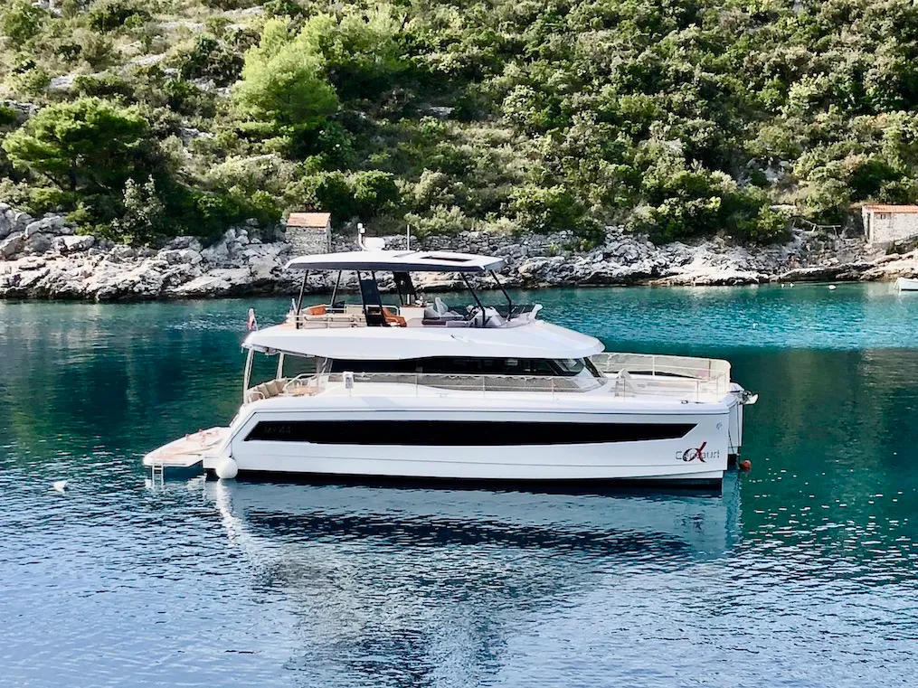 Exterior view of Alpha Centauri, a Fountaine Pajot MY44 catamaran at Grad Šibenik, Croatia