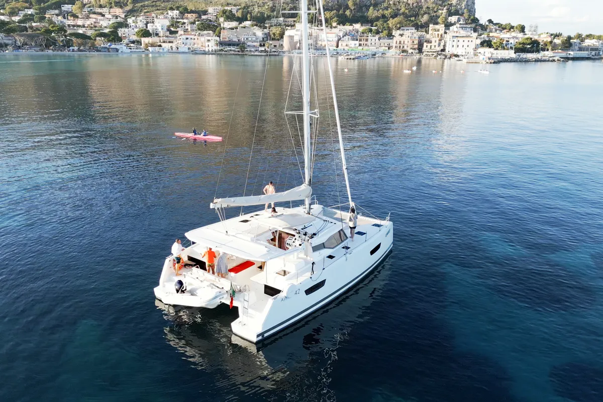 Exterior view of Rossa, a Fountaine Pajot Astrea 42 catamaran at Palermo, Italy