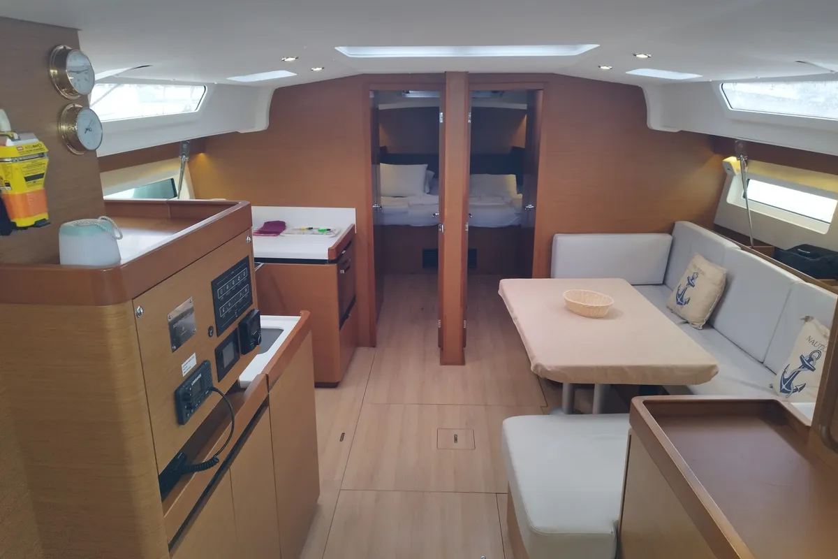Salon of MARINA GEN.+A.C. "Sails 2025", a Jeanneau Sun Odyssey 490 sailboat at Municipal Unit of Lefkada, Greece