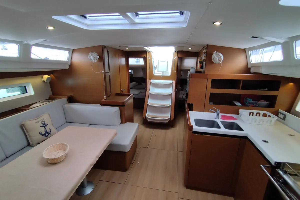 Salon of MARINA GEN.+A.C. "Sails 2025", a Jeanneau Sun Odyssey 490 sailboat at Municipal Unit of Lefkada, Greece