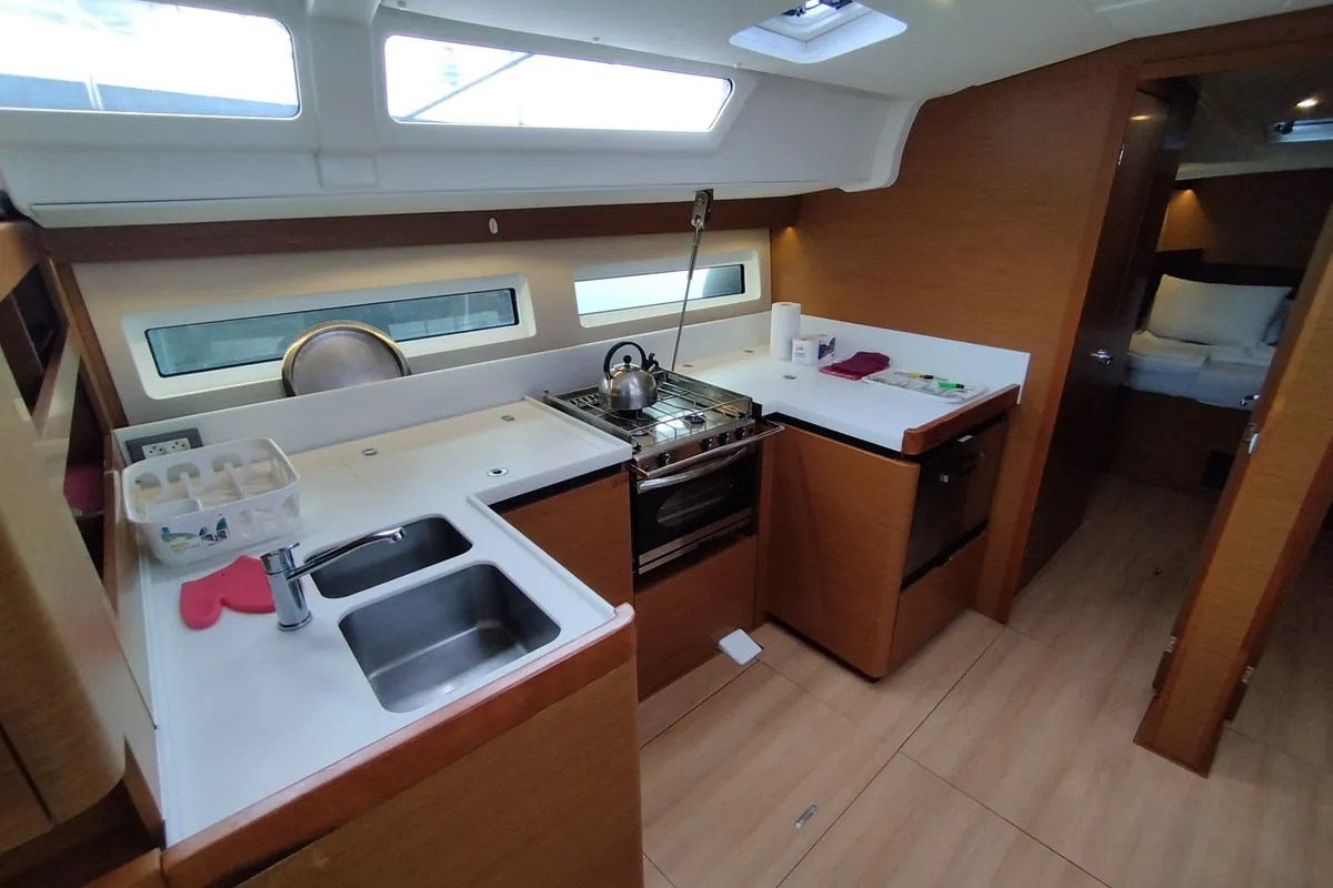 Galley of MARINA GEN.+A.C. "Sails 2025", a Jeanneau Sun Odyssey 490 sailboat at Municipal Unit of Lefkada, Greece