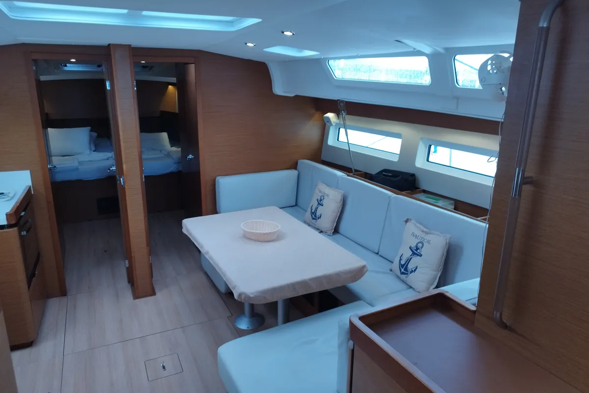 Salon of MARINA GEN.+A.C. "Sails 2025", a Jeanneau Sun Odyssey 490 sailboat at Municipal Unit of Lefkada, Greece