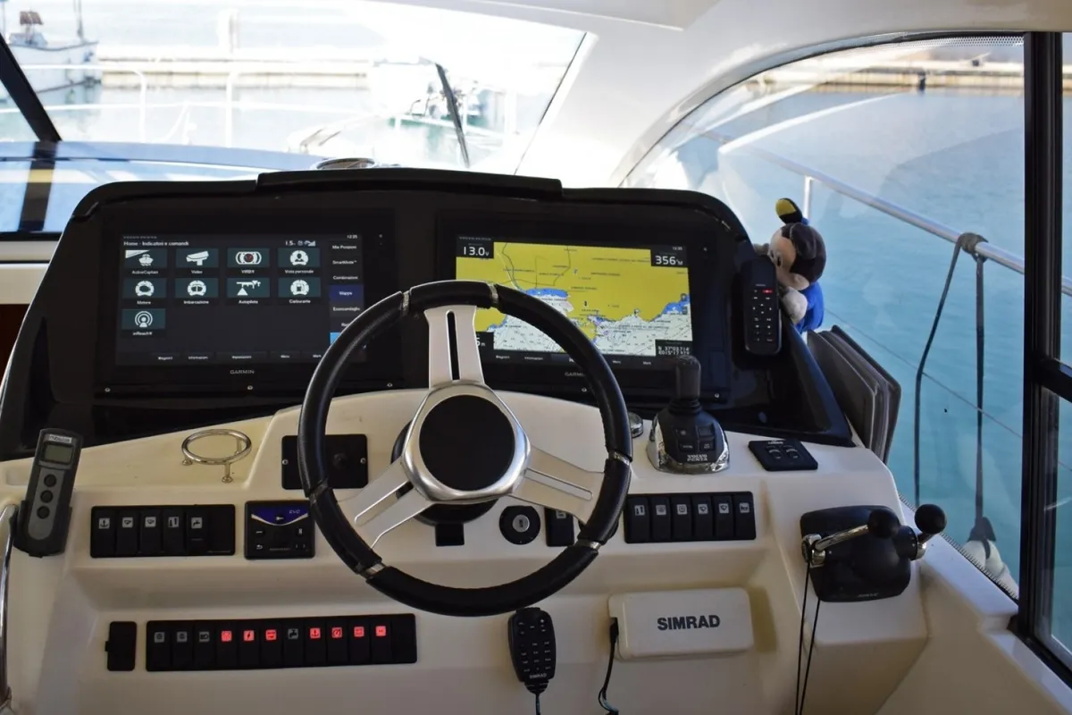 Cockpit of Pato, a Prestige 440 motorboat at Giardini Naxos, Italy