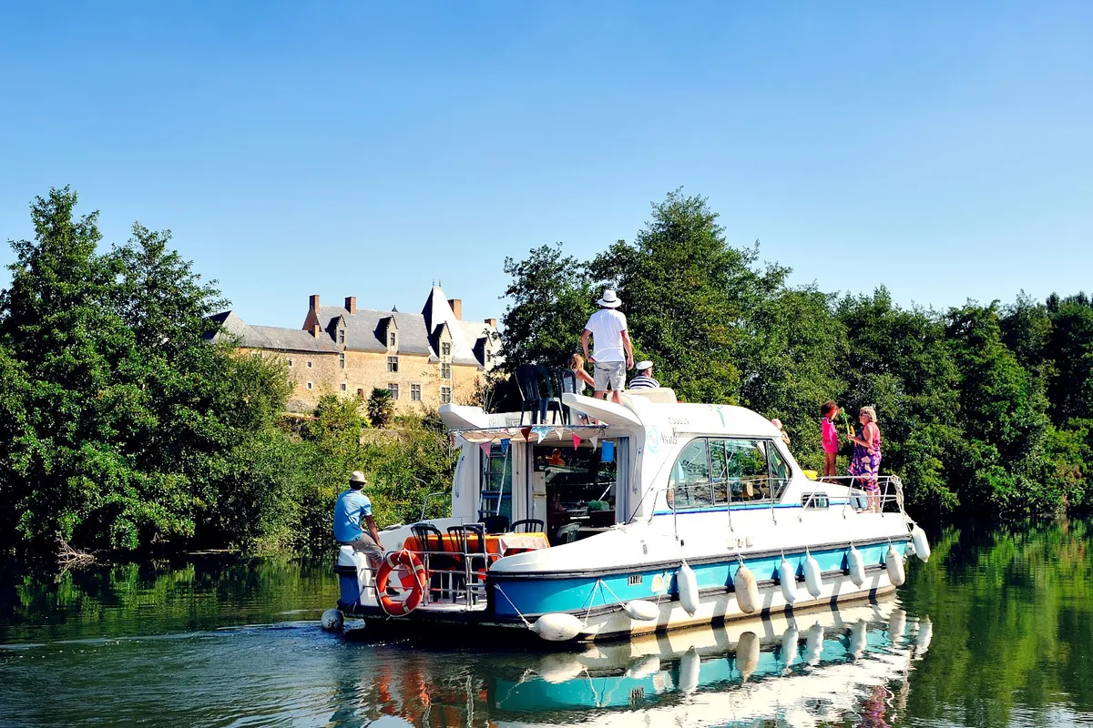 Exterior view of Mélodie, a Nicols Sedan 1170 motorboat at Sablé-sur-Sarthe, France