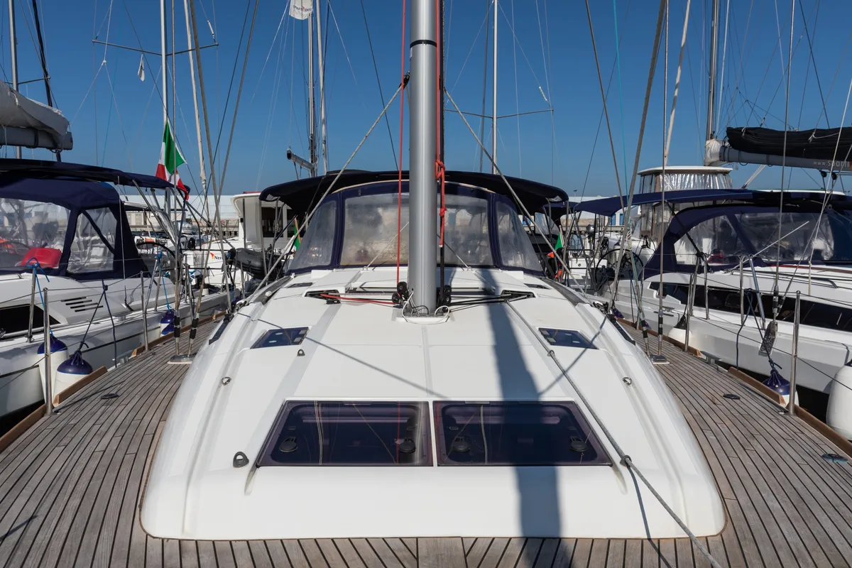 Deck of Chandra - Standard line, a Jeanneau Sun Odyssey 479 sailboat at Olbia, Italy
