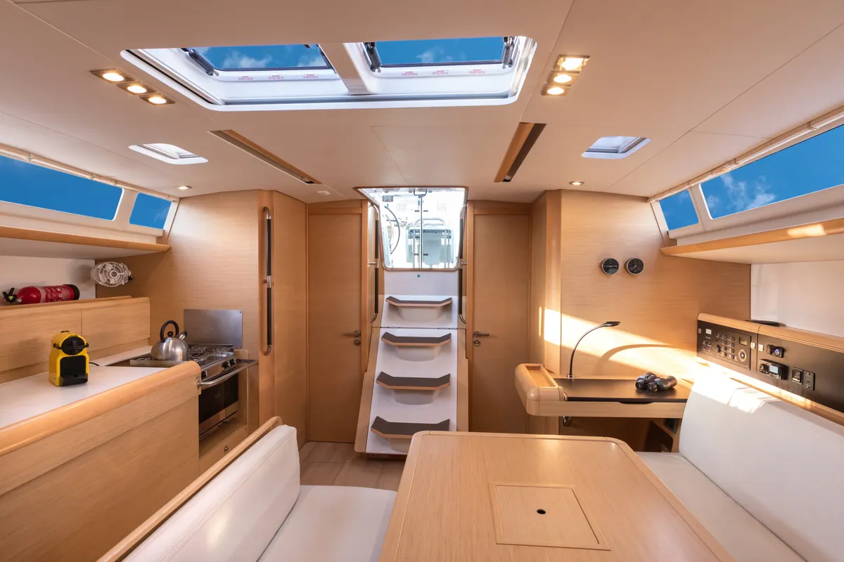 Salon of Chandra - Standard line, a Jeanneau Sun Odyssey 479 sailboat at Olbia, Italy