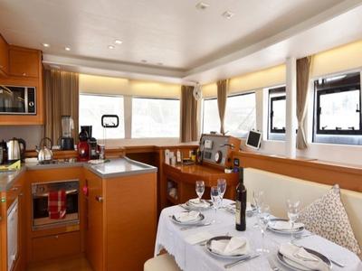Salon of Omiros II, a Lagoon 450 Fly catamaran at Athens, Greece