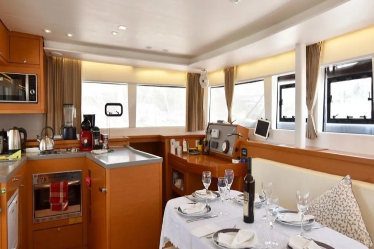 Salon of Omiros II, a Lagoon 450 Fly catamaran at Athens, Greece
