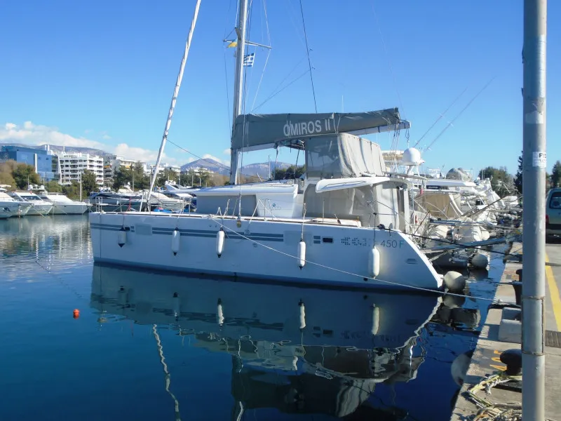 Exterior view of Omiros II, a Lagoon 450 Fly catamaran at Athens, Greece