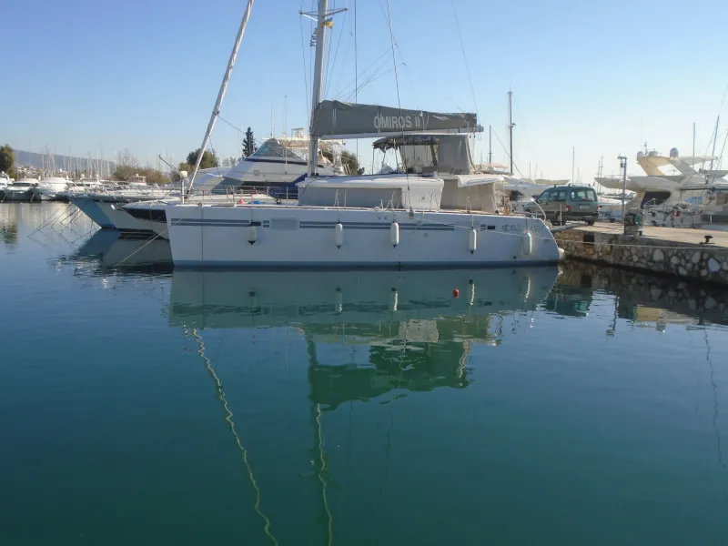 Exterior view of Omiros II, a Lagoon 450 Fly catamaran at Athens, Greece