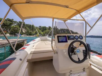 Cockpit of 281744ML, a Barracuda 530 RIB motorboat at Mali Lošinj, Croatia