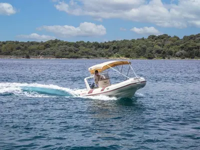 Exterior view of 281744ML, a Barracuda 530 RIB motorboat at Mali Lošinj, Croatia