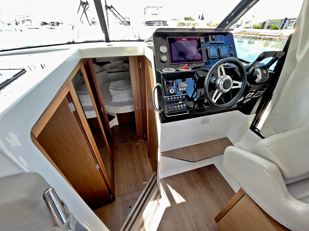 Cockpit of Helios, a Jeanneau Merry Fisher 1095 motorboat at Općina Sukošan, Croatia