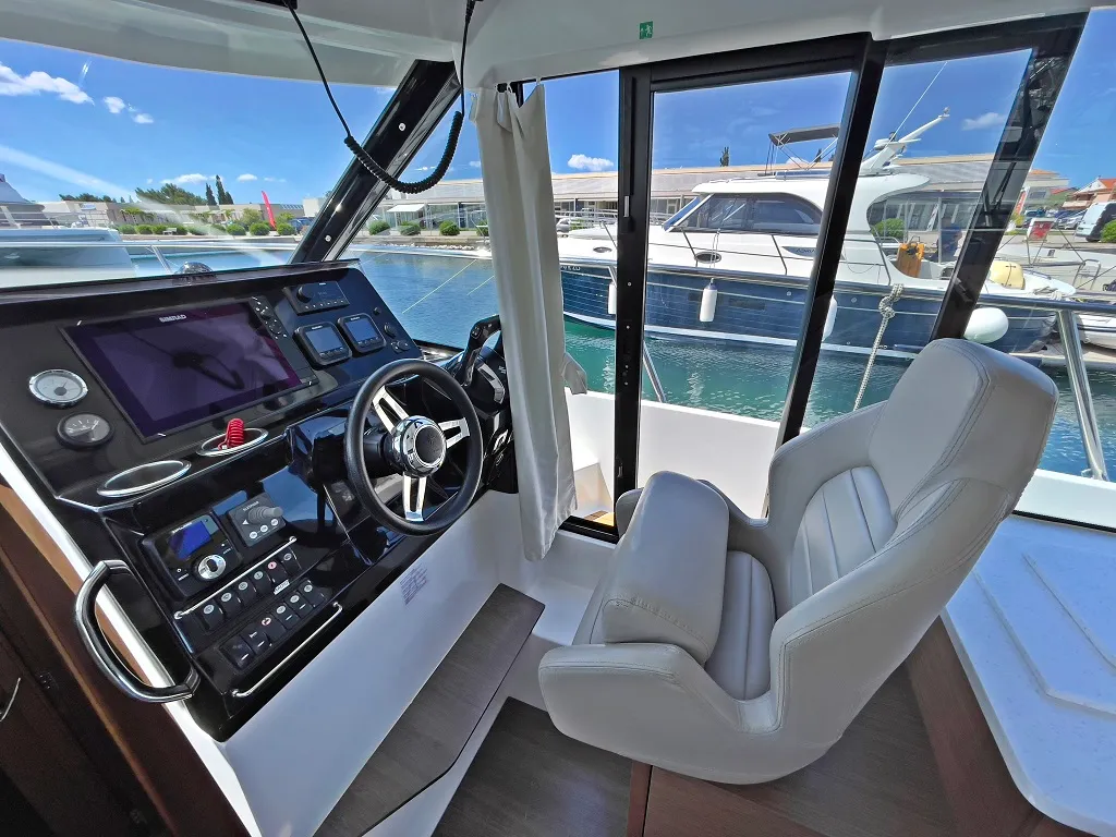Cockpit of Helios, a Jeanneau Merry Fisher 1095 motorboat at Općina Sukošan, Croatia