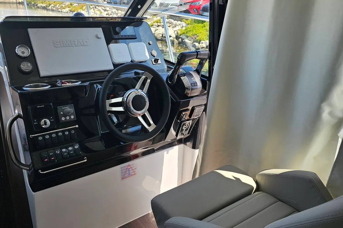 Cockpit of Helios, a Jeanneau Merry Fisher 1095 motorboat at Općina Sukošan, Croatia