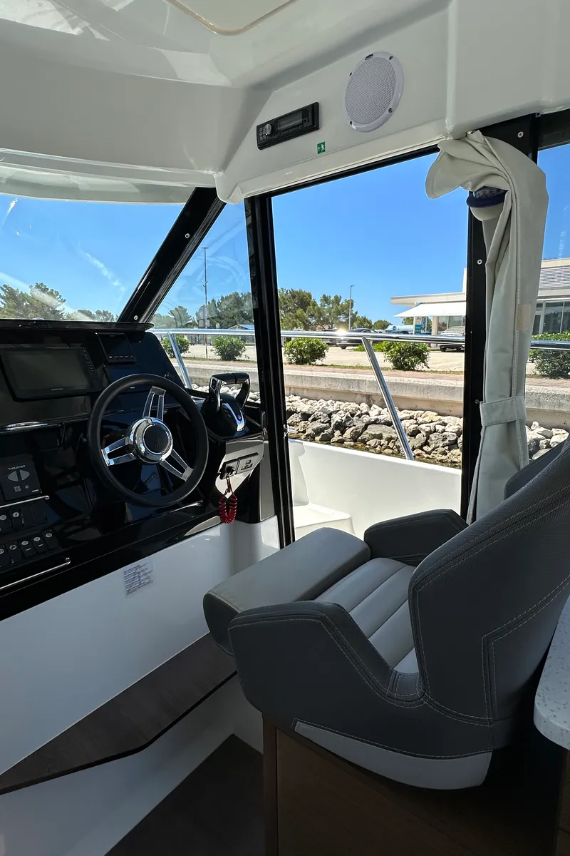 Cockpit of Morska Vila, a Jeanneau Merry Fisher 1095 FLY motorboat at Općina Pakoštane, Croatia